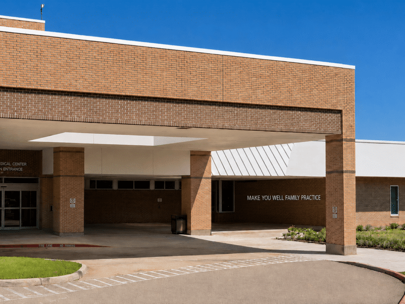 Exterior view of the Make You Well clinic in Sugar Land, Texas, providing accessible primary care and wellness services.